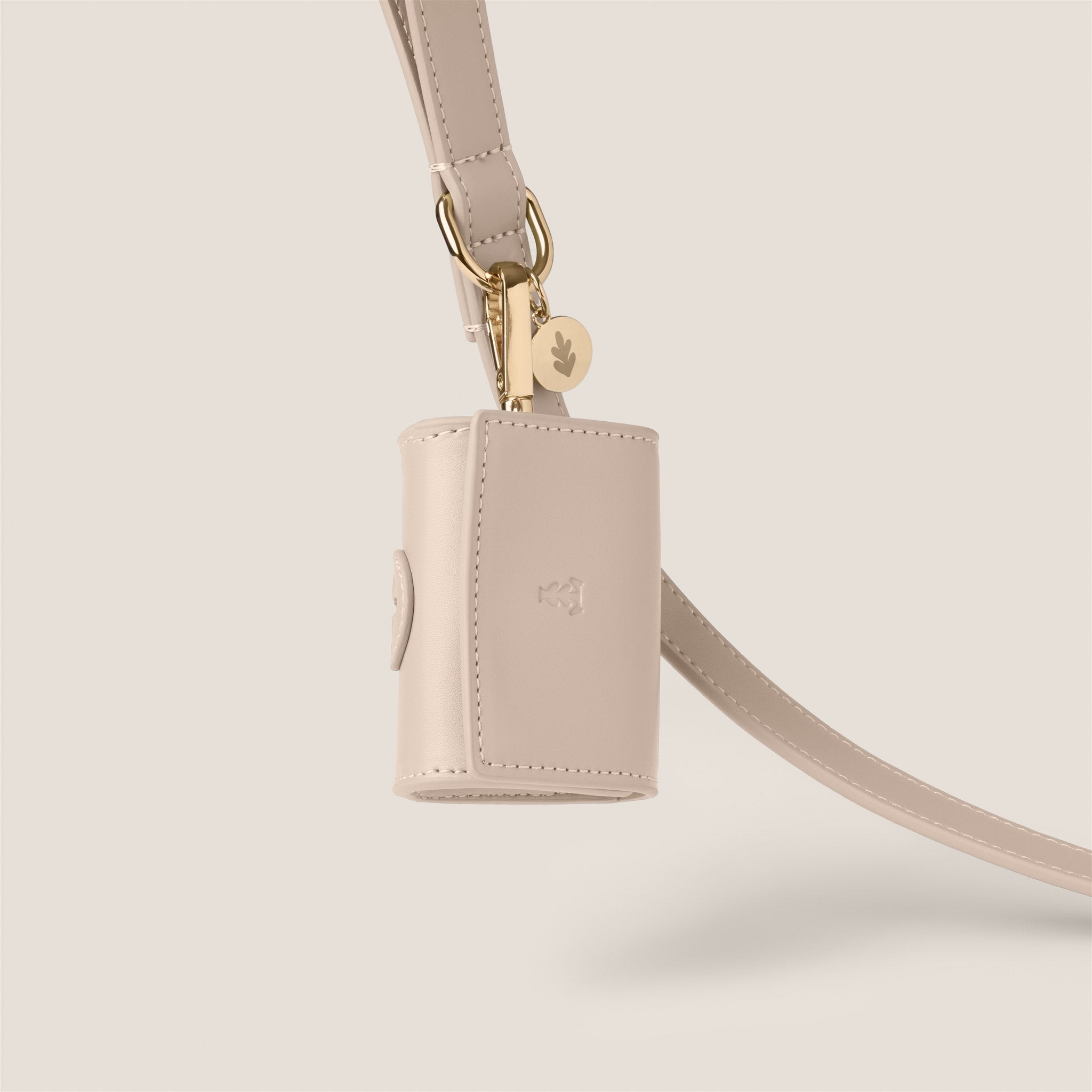 Ecru premium vegan leather poop bag holder by Tails & Bloom