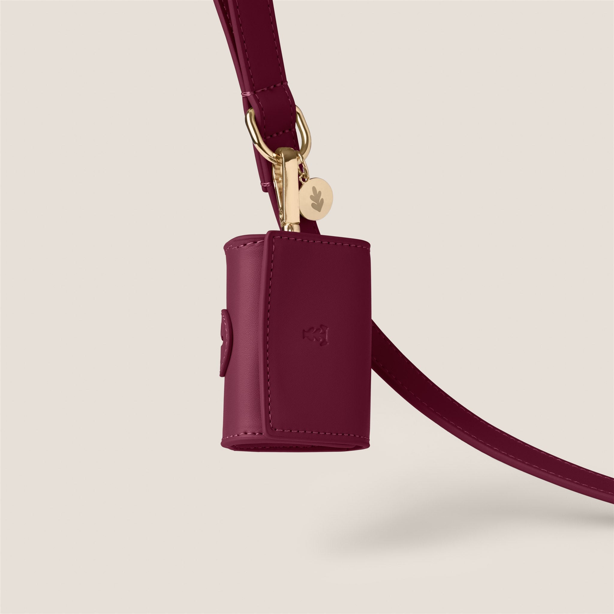 Deep maroon burgundy mulberry durable easy clean vegan leather poop bag holder for cockapoo & shih tzu by Tails & Bloom
