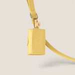 Pastel yellow primrose durable easy clean vegan leather poop bag holder for cockapoo & shih tzu by Tails & Bloom